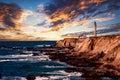 Lighthouse on the coast in California at sunset Royalty Free Stock Photo