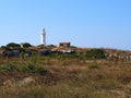 Lighthouse on the coast of Paphos Cyprus near the archeological site Royalty Free Stock Photo