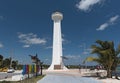 Lighthouse with colored lettering of tourist resort with marlin fish in Mahahual, Mexico