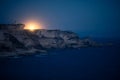 Lighthouse at dusk on the limestone cliff near Bonifacio