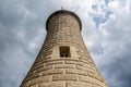 The Lighthouse at the end of the North Pier in Tynemouth, England, on a cloudy day Royalty Free Stock Photo