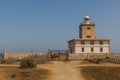 Lighthouse at the end of a road on the Island of Tabarca Royalty Free Stock Photo