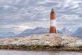 The Lighthouse at the End of the World, on rocks. Royalty Free Stock Photo