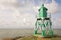 Lighthouse at the entrance of the port of Stavoren. Royalty Free Stock Photo