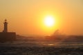 Lighthouse Felgueirasin Porto with wave splash at sunset Royalty Free Stock Photo