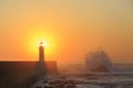 Lighthouse Felgueirasin Porto with wave splash at sunset Royalty Free Stock Photo