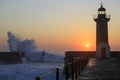 Lighthouse Felgueirasin Porto with wave splash at sunset Royalty Free Stock Photo