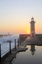 Lighthouse Felgueirasin Porto with wave splash at sunset Royalty Free Stock Photo