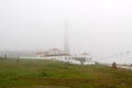 Lighthouse on a foggy morning