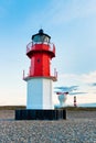 Lighthouse with foghorn and another lighthouse in