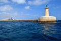 Lighthouse in Grand harbor, Malta Royalty Free Stock Photo