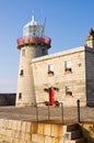 Lighthouse at Howth harbor in Ireland