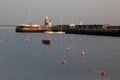 Lighthouse at Howth port. Howth is a fishing small port near Dublin Bay. Royalty Free Stock Photo