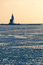 Lighthouse in the ice Royalty Free Stock Photo