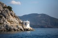 Lighthouse on the island in the Aegean sea.