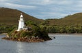 Lighthouse on an island in Macquarie Harbour Royalty Free Stock Photo