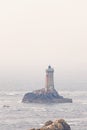 Lighthouse La vieille on a rock at the Pointe du raz in Bretagne Royalty Free Stock Photo