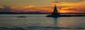 Lighthouse on Lake Champlain at sunset Royalty Free Stock Photo