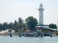 Lighthouse and landing pier on isolated island