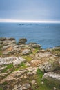Lighthouse in the Lands End in Cornwall Royalty Free Stock Photo