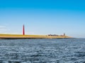 Lighthouse Lange Jaap at North Sea coast, Huisduinen, Den Helder, Netherlands