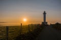 Lighthouse of Lastres at sunset captured in the town of Luces, Spain Royalty Free Stock Photo