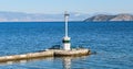 Lighthouse on Limenas Port of Thasos or Thassos Greek island in the North Aegean Sea