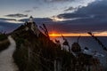 Beautiful Sunrise at the Ocean with Lighthouse