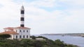 Lighthouse of the Mallorcan town of Portocolom in winter