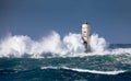 The lighthouse of the Mangiabarche shrouded by the waves of a mistral wind storm Royalty Free Stock Photo