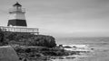 Lighthouse in Margaretsville, Nova Scotia. Overcast spring day in the Bay of Fundy.