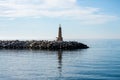 Lighthouse in marina on sunrise in Banus, Marbella, Spain