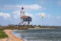 The lighthouse of Marken, a small island in the Markermeer in the Netherlands. Royalty Free Stock Photo