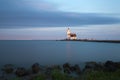 Lighthouse in Marken at sunset Royalty Free Stock Photo