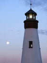 Lighthouse and moon Cayuga Lake at sunrise Royalty Free Stock Photo