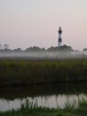 Lighthouse in the morning mist Royalty Free Stock Photo