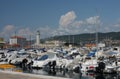 Lighthouse, motor boats and sailboats in harbor in Trieste, Ital Royalty Free Stock Photo