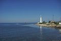 Lighthouse near the sea. Beautiful landscape. Summer background. Royalty Free Stock Photo