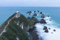 Lighthouse on Nugget Point. It is located in the Catlins area on the Southern Coast of New Zealand, Otago region. The Lighthouse Royalty Free Stock Photo