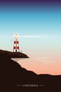 Lighthouse by the ocean at beautiful sunset seascape Royalty Free Stock Photo