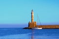 Lighthouse in old harbour of Chania and yacht in the morning, Crete, Greece Royalty Free Stock Photo