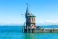 Lighthouse on old pier in harbor of Constance city or Konstanz, Germany Royalty Free Stock Photo