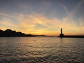 Lighthouse in the Old Venetian Harbour in Chania during sunset. Crete. Greece Royalty Free Stock Photo