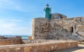 Lighthouse over Castello Maniace Castle fortress at Ionian sea on Ortigia island old town of Syracuse in Sicily in Italy