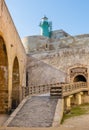 Lighthouse over Castello Maniace Castle fortress at Ionian sea on Ortigia island of Syracuse in Sicily in Italy