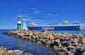 Lighthouse with passenger ship on the Baltic Sea at the harbor entrance, WarnemÃÂ¼nde, Germany