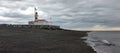 lighthouse in patagania chilena by the seashore, on magellan strait