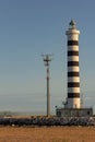 The lighthouse of Piave Vecchia is located at the mouth of the Sile, called, precisely, the port of Piave Vecchia, in the municipa Royalty Free Stock Photo