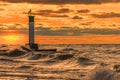 Lighthouse and pier on Lake Huron under a stormy sky - Ontario,