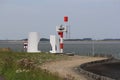 A lighthouse at the pier of the westerschelde sea in zeeland, the netherlands